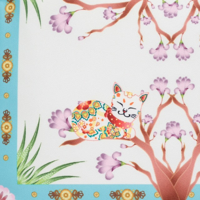 Colorful cat illustration with floral patterns on a decorative background