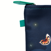 Navy blue pouch with a fox design and star patterns on a white background