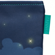 Navy blue fabric with star and cloud pattern and Papinelle label.