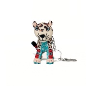 Leopard keychain with a colorful pattern on a white background