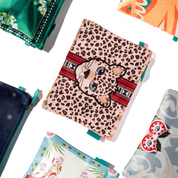 Collection of colorful fabric samples with various patterns on a white background