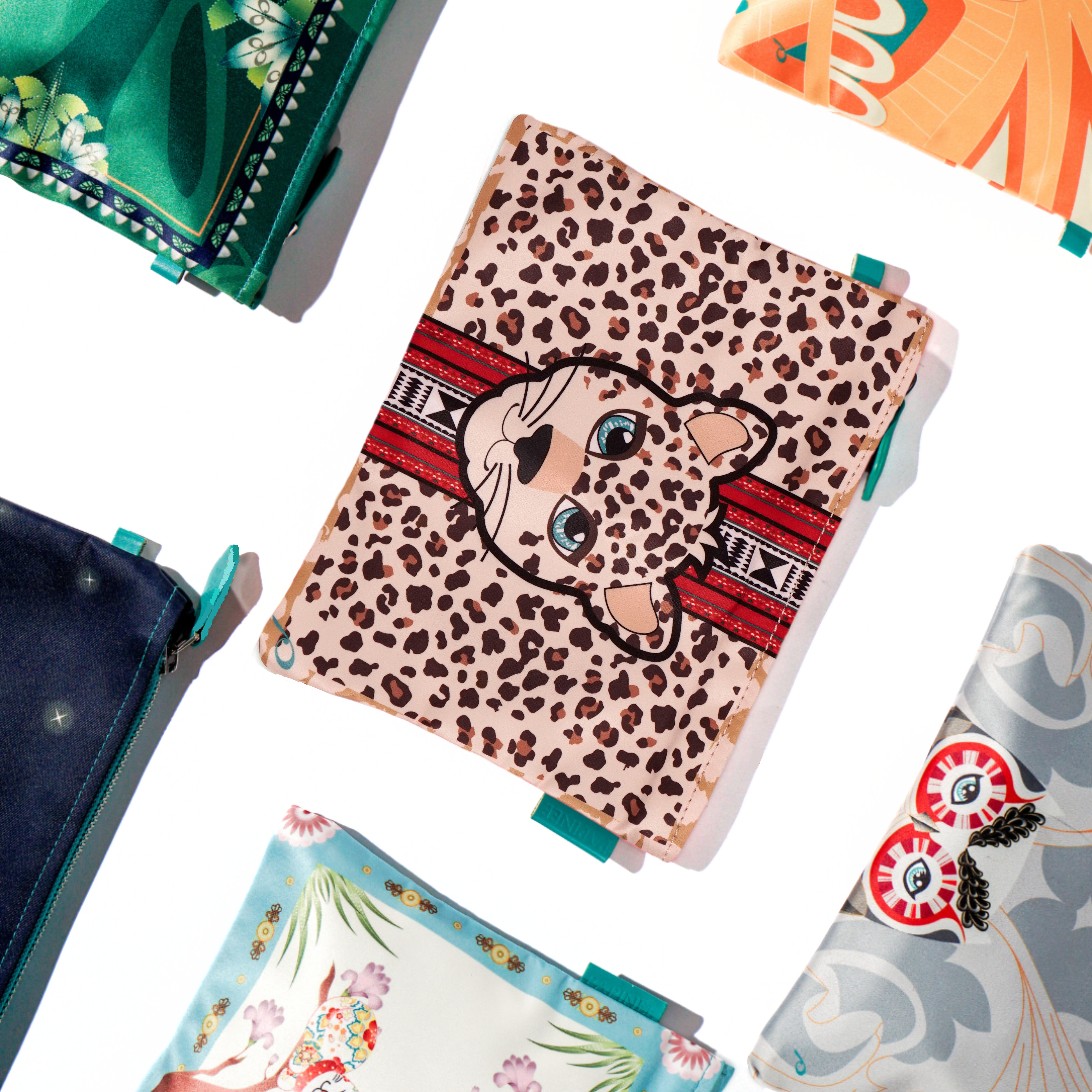 Collection of colorful fabric samples with various patterns on a white background