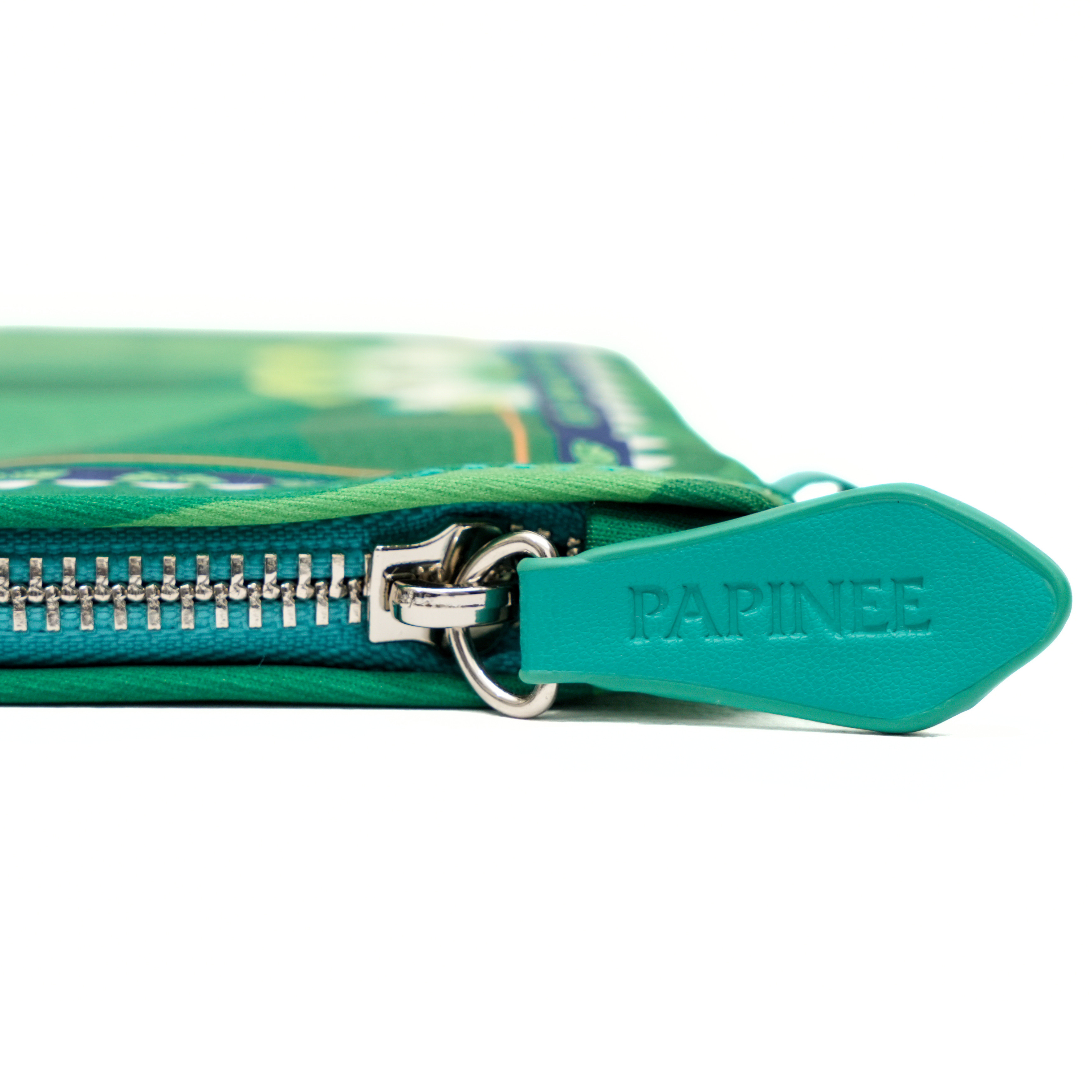 Green zipper pouch with 'PAPINEE' branding on a white background